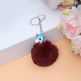 Sea Horse Character Fluffy Ball hanging Keychain (Any Random Color)