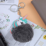 Unicorn Character Fluffy Ball hanging Keychain (Any Random Color)